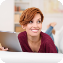 Smiling woman with short red hair