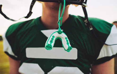 Patient in Torrance showing off Athletic mouthguard