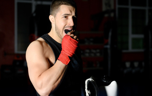 Patient in Torrance preparing for boxing with Athletic mouthguard