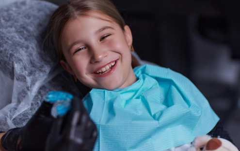 Patient in Torrance smiling with sportsguard